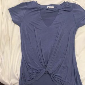 cut out v top with a cute twist on bottom